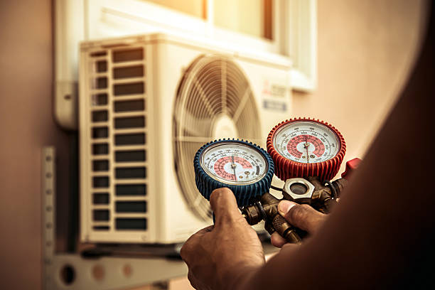 Professional Heat Pump Repair technician working in Woods Cross, UT
